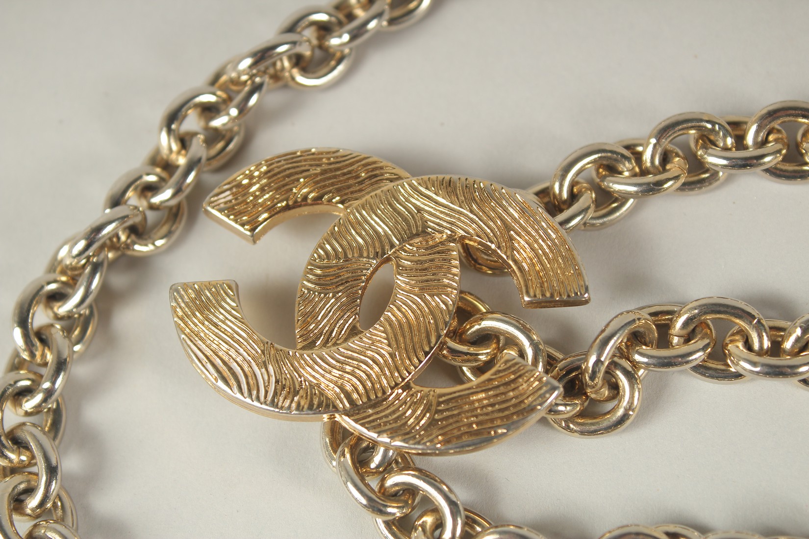 A LONG CHANEL GILT BELT with pendant and tie, double C emblem. 110cms long. - Image 2 of 9
