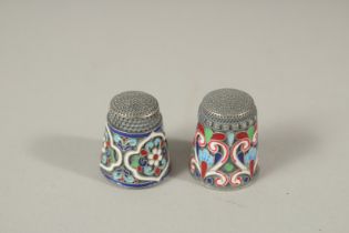 TWO RUSSIAN SILVER AND ENAMEL THIMBLES.