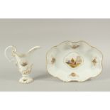 A MEISSEN BASIN AND EWER painted with cartouches of figures set against river and seascapes. Both