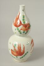 A CHINESE DOUBLE GOURD FISH VASE. Mark to blue circles. 28cms high.