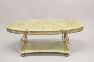 A GOOD ONYX AND GILT METAL OVAL COFFEE TABLE with classical supports and under tier. 4ft long x
