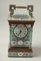 A LARGE GILT METAL AND CLOISONNE ENAMEL BLUE REPEATER CARRIAGE CLOCK. 17cms high.