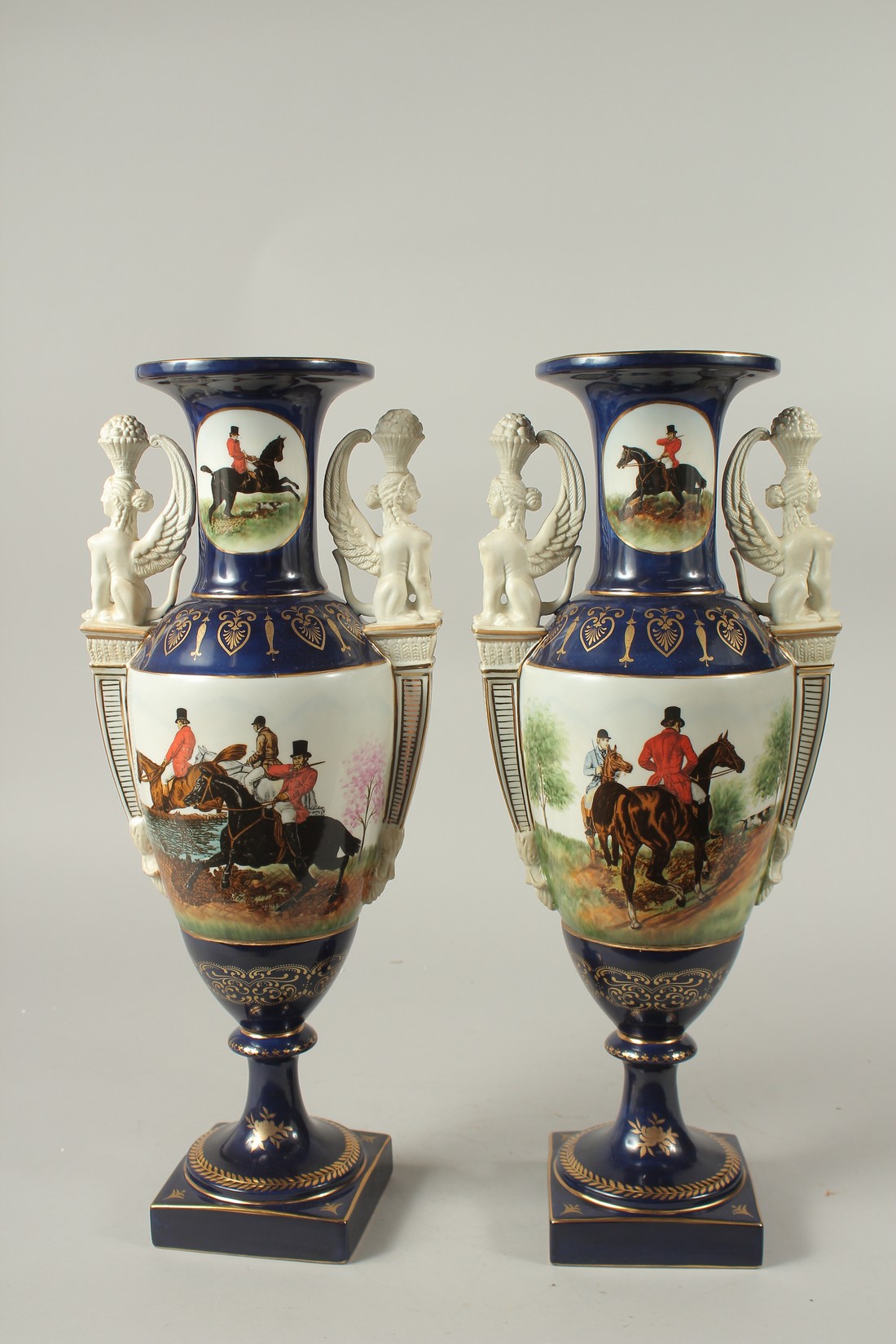 A PAIR OF SEVRES DESIGN BLUE GROUND TWO HANDLED HUNTING VASES. 46cms high. - Image 5 of 5