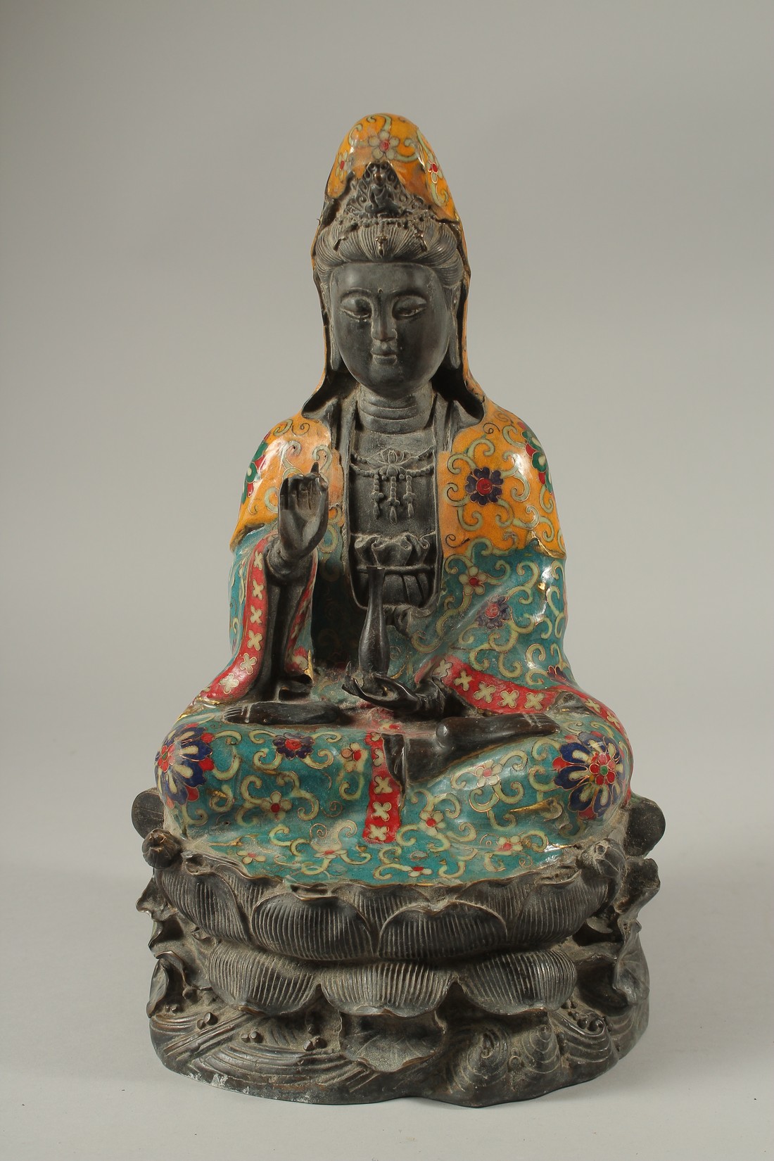 A CHINESE BRONZE AND ENAMEL BUDDHA. 36cms high.
