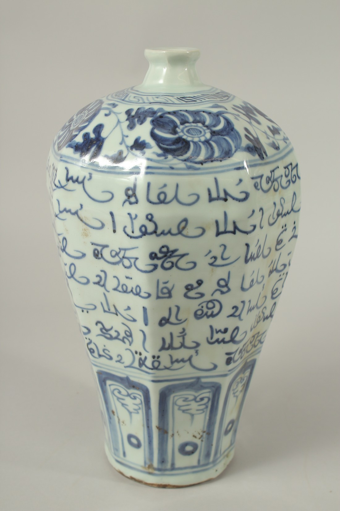 A CHINESE PORCELAIN BLUE AND WHITE ARABIC VASE. 32cms high.