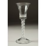 A GEORGIAN WINE GLASS with an air twist stem. 6ins high.