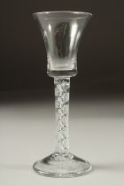 A GEORGIAN WINE GLASS with an air twist stem. 6ins high.