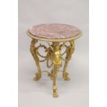 A GOOD EMPIRE DESIGN CIRCULAR GILT BRONZE MARBLE TOP TABLE with three winged classical figures