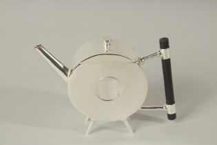 A CHRISTOPHER DRESSER DESIGN PLATE POLO WITH THE HOLE TEAPOT.