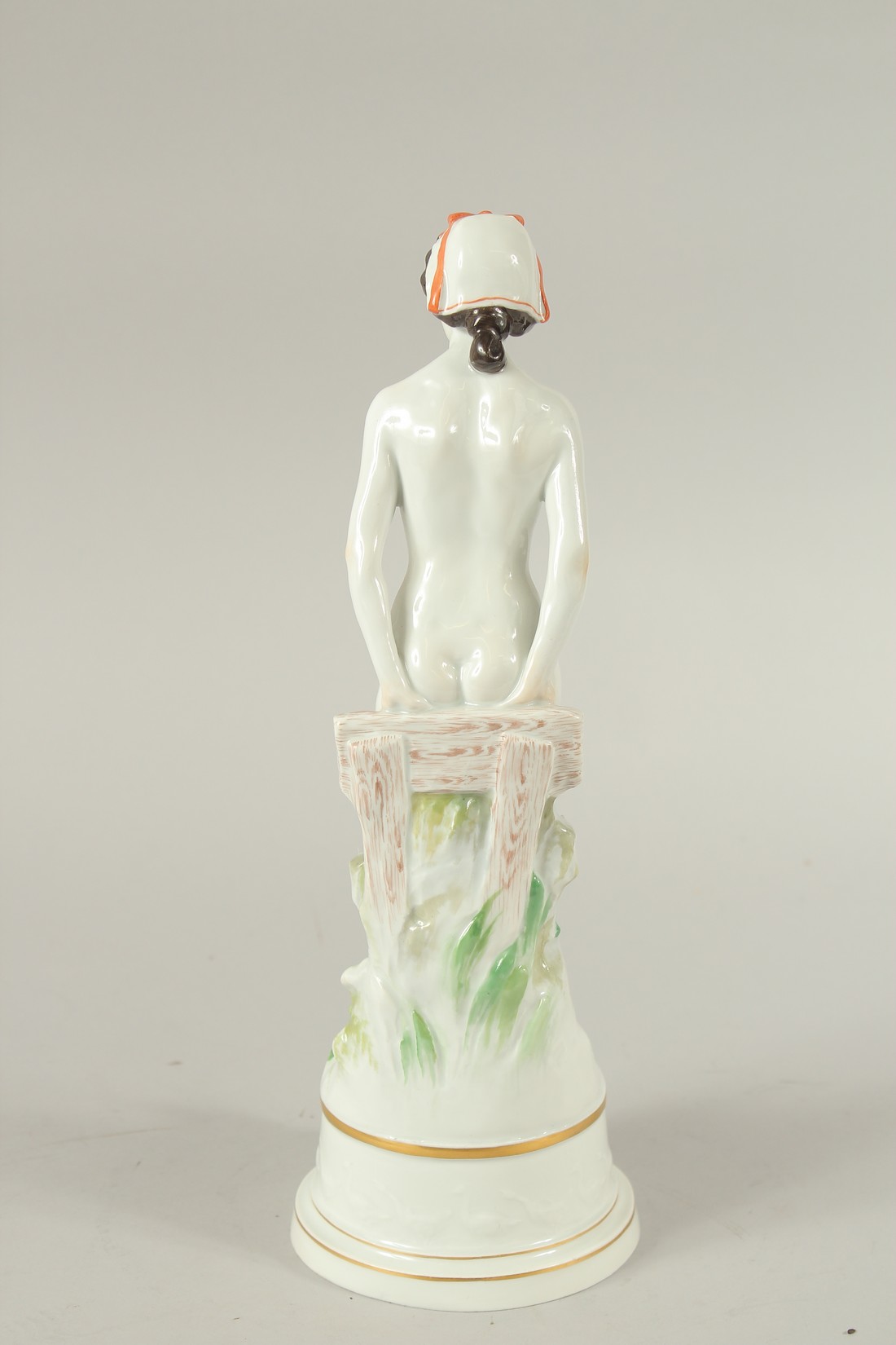 A MEISSEN FIGURE OF A STANDING WOMAN RESTING ON A FENCE. A circle of geese around the base. Modelled - Image 3 of 6