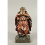 A FINE 17TH - 18TH CENTURY CARVING, A MAN PRAYING. 15ins high.