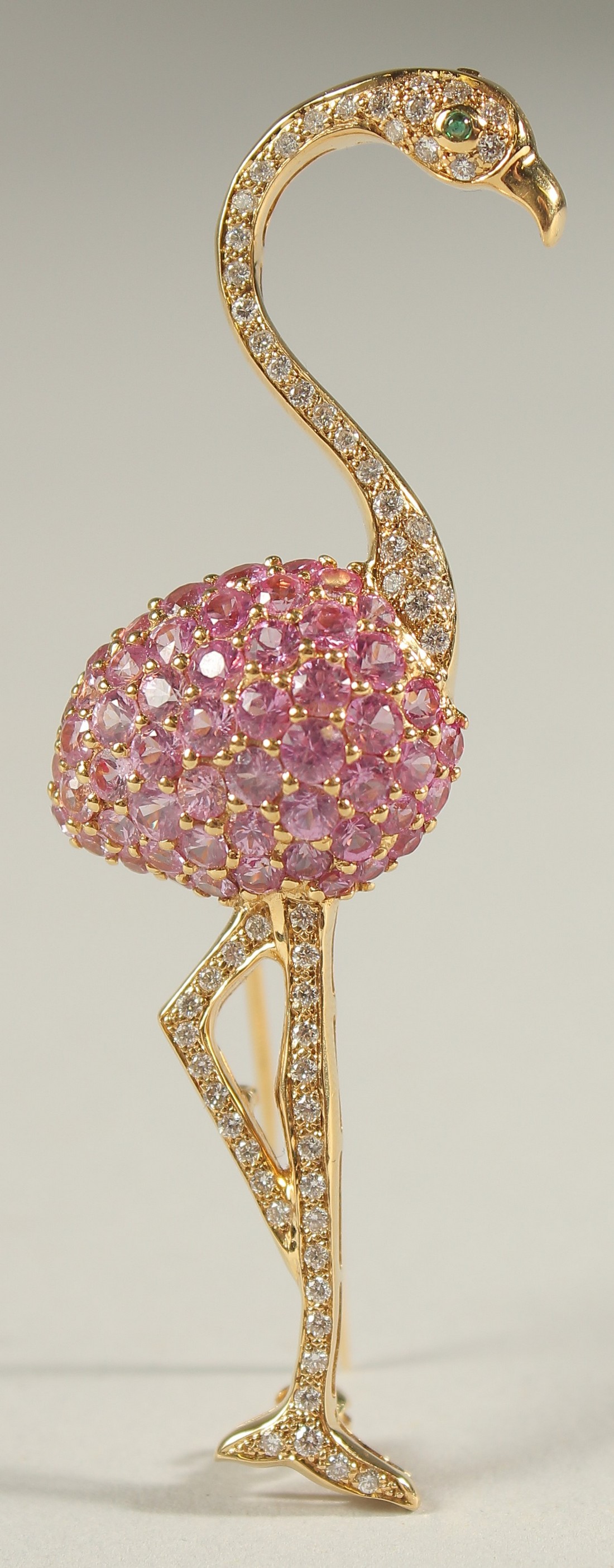 AN 18CT YELLOW GOLD, SAPPHIRE AND DIAMOND FLAMENCO BROOCH.