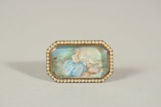A GEORGIAN 18CT YELLOW GOLD BROOCH, a young girl feeding doves, boxed.