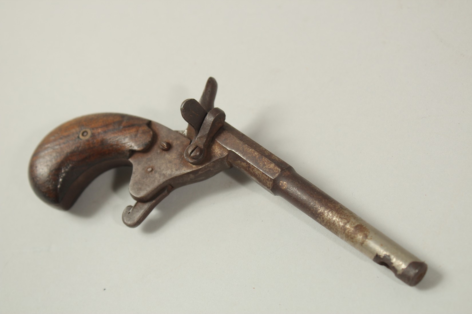 A SMALL PERCUSSION CAP GUN. 6ins long. - Image 2 of 2