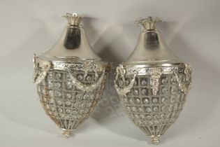 A PAIR OF SILVER PLATE ACORN LIGHT FITTINGS. 40cms long.