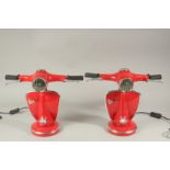 A PAIR OF RED VESPA LAMPS.