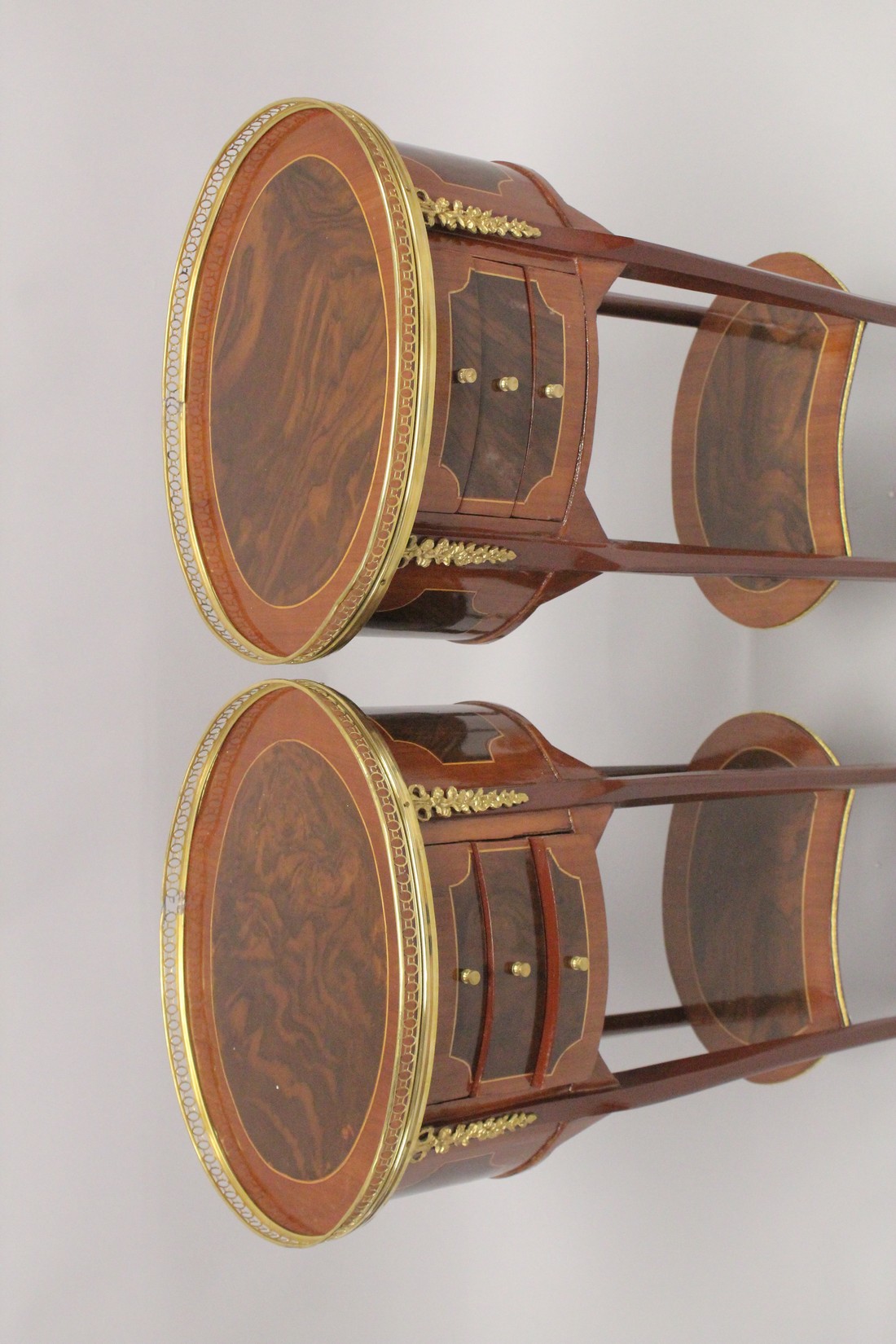 A PAIR OF LOUIS XVITH DESIGN INLAID OVAL BEDSIDE CUPBOARDS with three drawers, under tier and - Image 2 of 2