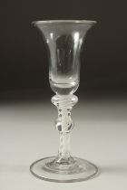 A GEORGIAN WINE GLASS with white opaque twist stem and single knop. 6ins high.