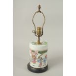 A CHINESE PORCELAIN TEA JAR LAMP painted with figures. 40cms high including fittings.