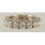 A SUPERB 18CT WHITE GOLD AND DIAMOND ETERNITY RING. 4ct of diamonds.
