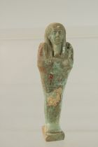 AN EGYPTIAN TOMB FIGURE. Label reads: Pyramids, April 10, 1871. 4.5ins long.