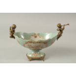 A SEVRES STYLE PORCELAIN AND GILT METAL OVAL COMPORT with cupid handles. 28cms long.