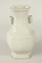 A CHINESE CRACKLE GLAZE TWIN HANDLE VASE. 22.5cms high.