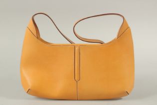 LANCEL, AN ORANGE BAG, in dust bag. 31cms long.