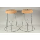 A PAIR OF CHAMPAGNE CORK STOOLS.