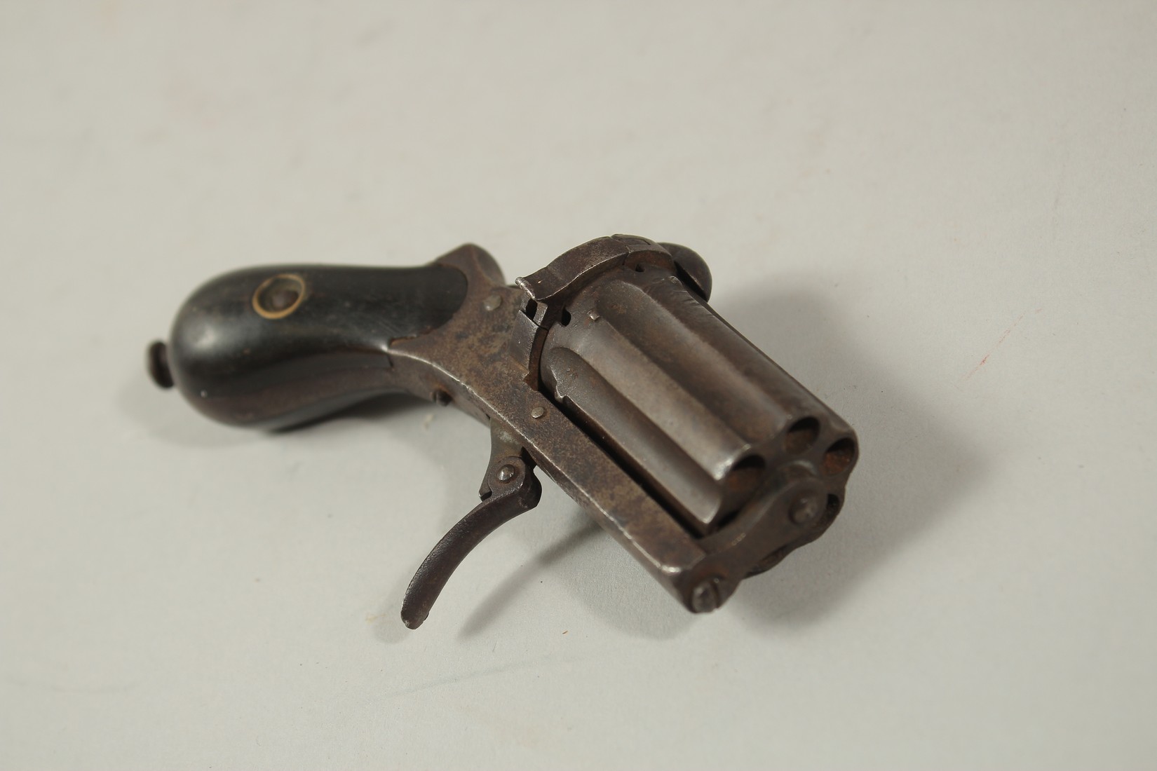 A SMALL SIX CHAMBER PEPPER POT GUN. 3.5ins long - Image 2 of 2