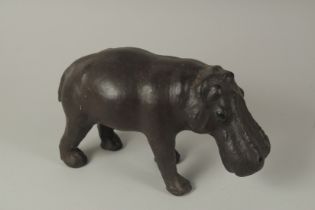 A SMALL LEATHER HIPPOPOTAMUS, probably LIBERTY. 11ins long x 6ins high.