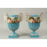 A LARGE PAIR OF SEVRES DESIGN CIRCULAR RAM'S HEAD BLUE VASES. 40cms high.