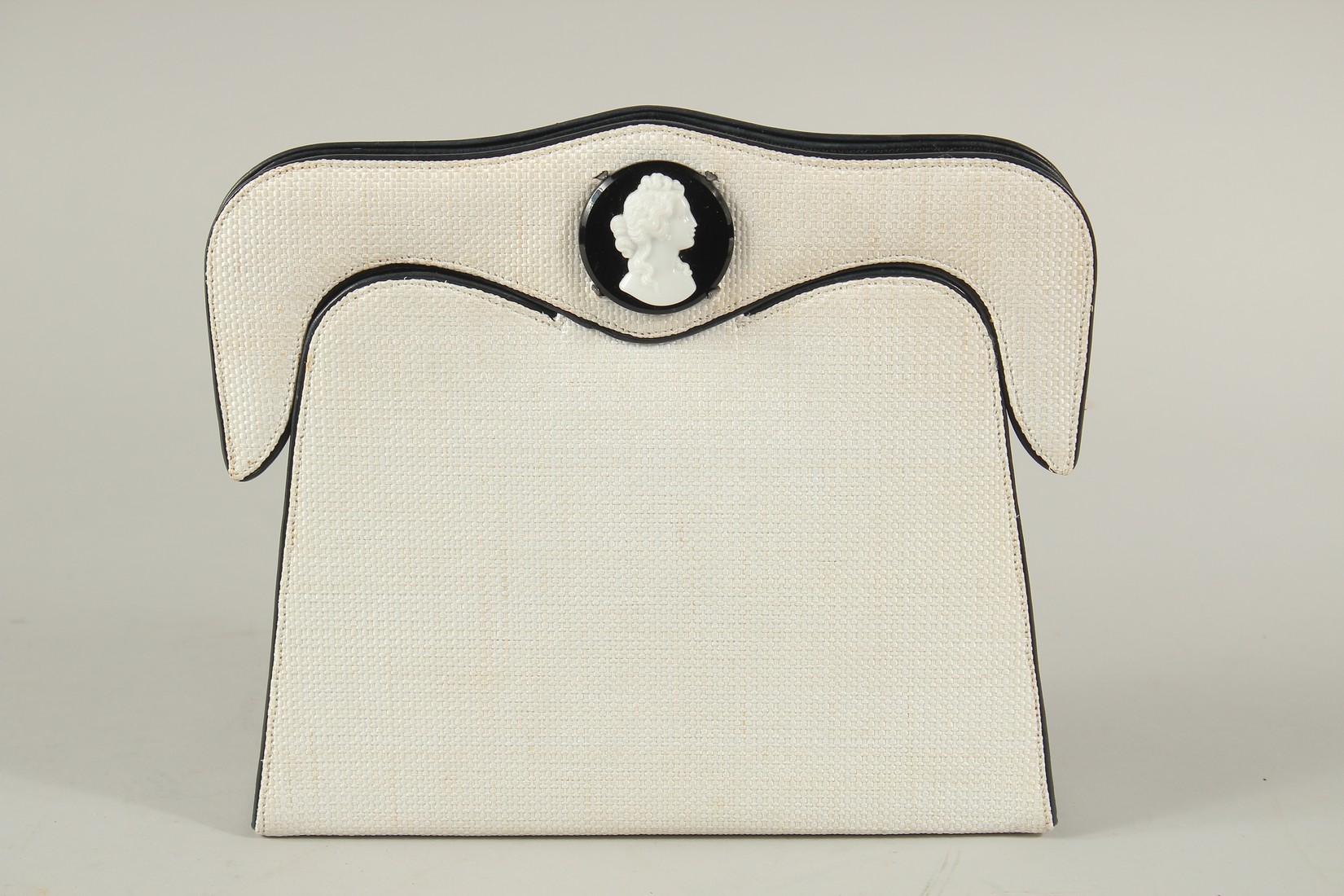 A RENAUD PELLEGRINO, PARIS, WHITE HESSIAN BAG with a cameo. 23cms long x 19cms deep.