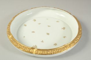 A ROSENTHAL DISH with moulded gilt fruit rim and sprays of flowers. Signed in gilt: Hayling, "