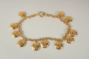 A MATCHING CHANEL GILT NECKLACE with ten pendants.
