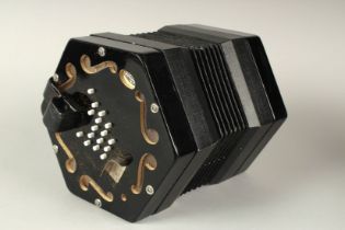 A JACK BARITONE 30 KEY CONCERTINA. Concertina Connection lacquered case. 8ins, 30 white keys with