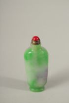 A CHINESE JADE SNUFF BOTTLE AND STOPPER.