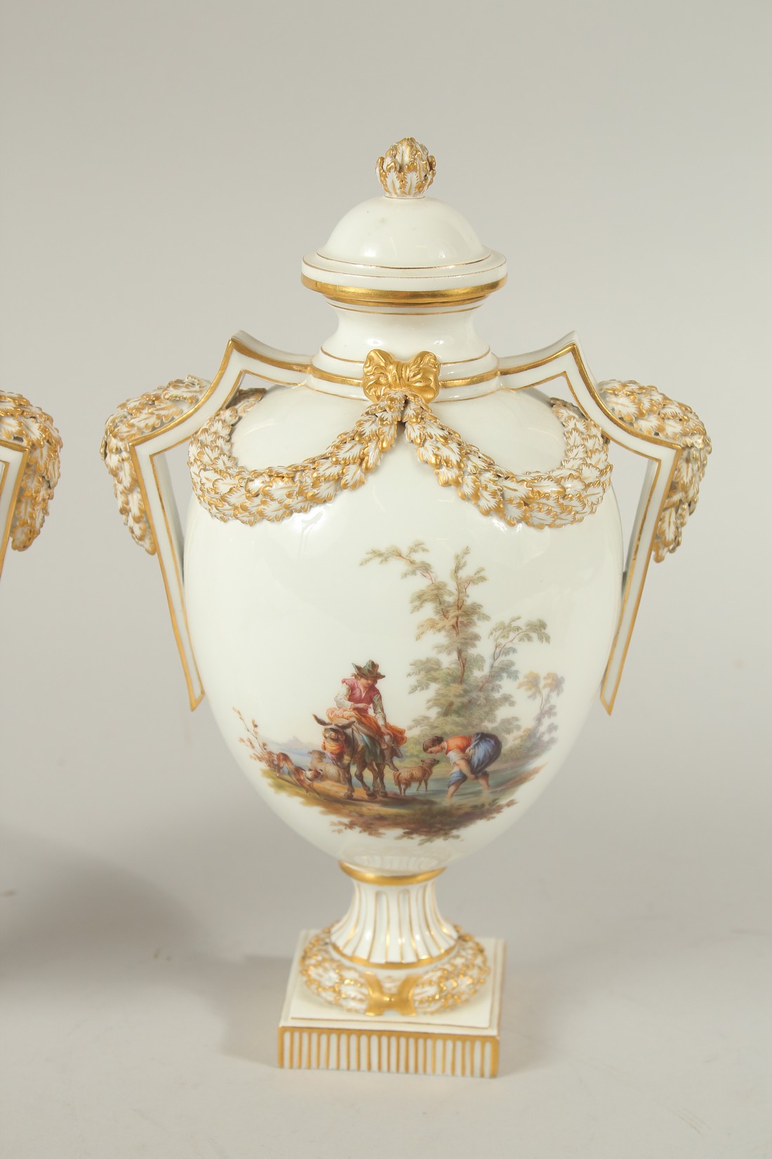 A PAIR OF MEISSEN LIDDED VASES painted with figures in pastoral landscapes. The body of the vases - Image 3 of 8