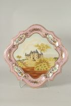 A SEVRES DESIGN PORCELAIN SHAPED PLATTER painted with a castle. 40cms.