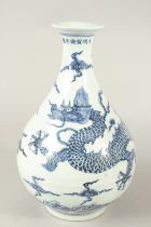 A CHINESE BLUE AND WHITE DRAGON YUHUCHUNPIN VASE. 33cms high.