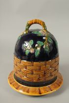 A MINTON DESIGN MAJOLICA CHEESE DISH AND COVER.