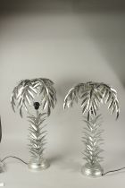 A PAIR OF SILVER PLATE PALM TREE LAMPS. 70cms high.