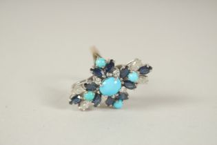 AN 18CT GOLD, SAPPHIRE, DIAMOND AND TURQUOISE RING.