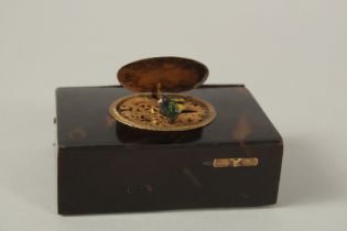 A GOOD SWISS SINGING BIRD BOX in a tortoiseshell case, with singing bird, the flap engraved with two