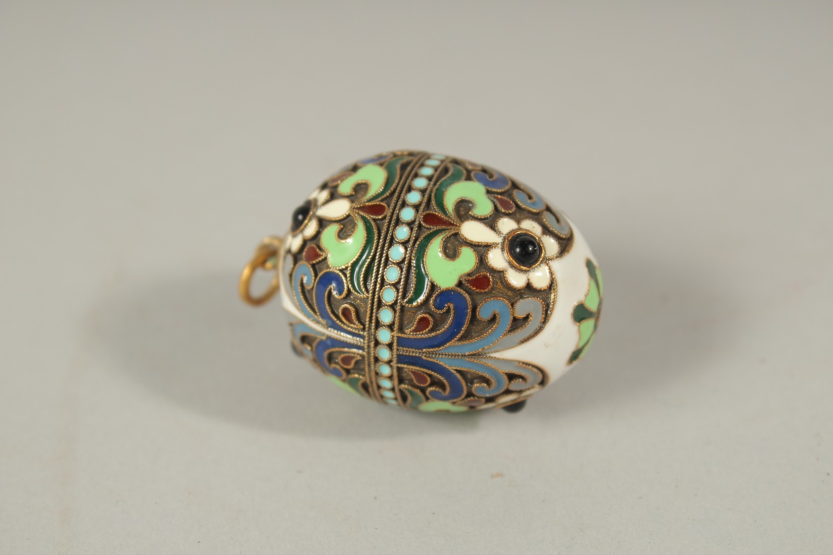 A LARGE RUSSIAN SILVER AND ENAMEL EGG PENDANT. 2.5cms.
