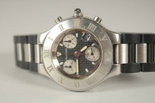 A CARTIER STAINLESS STEEL CHRONOMETER. 33541 PL, with a black rubber strap, in a red folder and