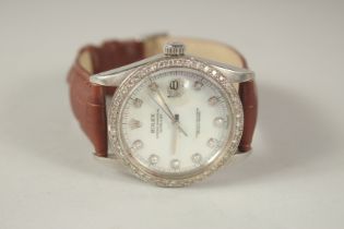 A ROLEX DIAMOND AND MOTHER-OF-PEARL WRISTWATCH with leather strap. Oyster Perpetual Datejust, with