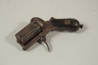 A SMALL SIX CHAMBER PEPPER POT GUN. 3.5ins long