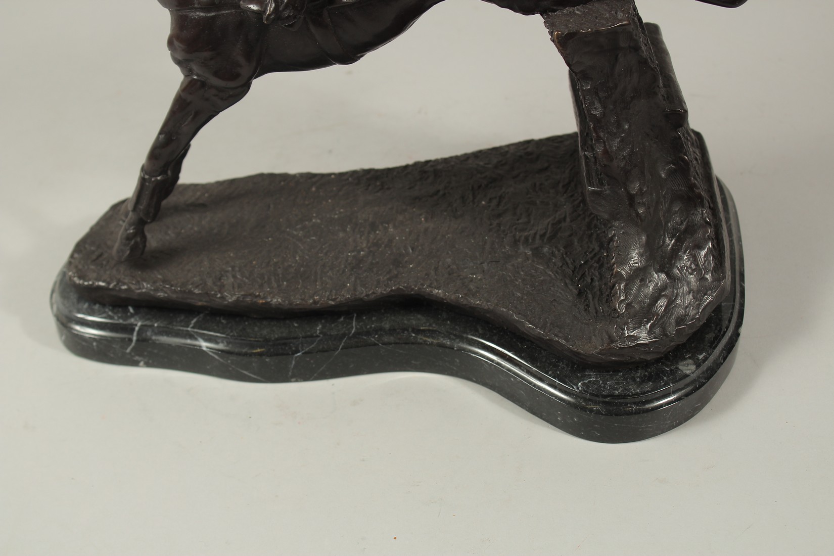 A FINE BRONZE GROUP, HORSE AND JOCKEY OVER THE FENCE, on a marble base. 12ins high. - Image 3 of 6