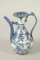 A CHINESE BLUE AND WHITE PORCELAIN EWER. 16.5cms high.